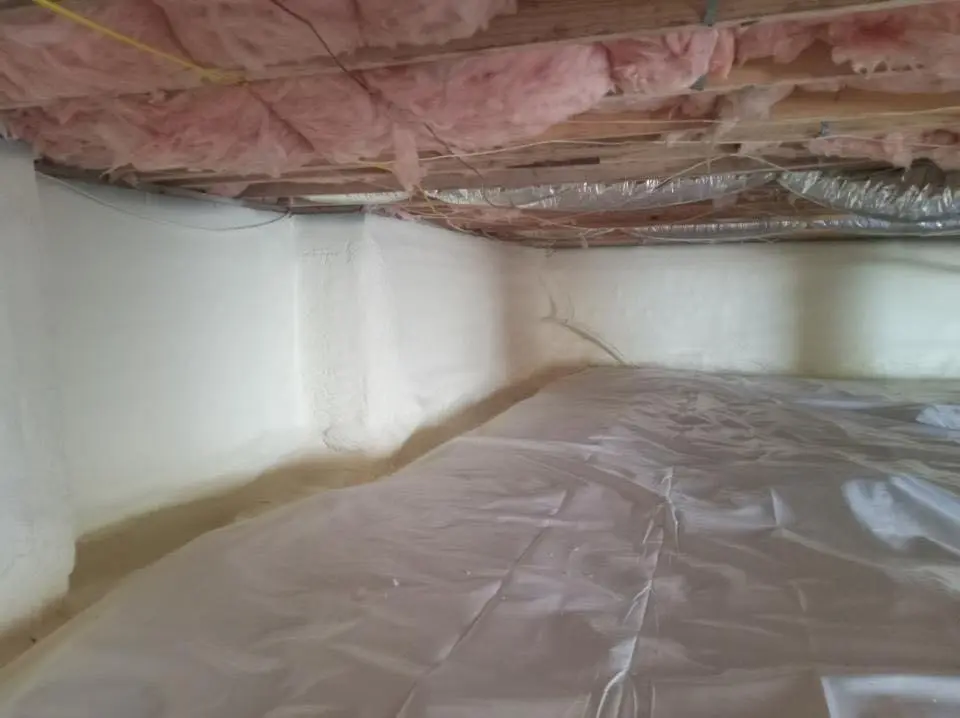Crawl space encapsulation with closed-cell spray foam for Roof Waterproofing in Portage